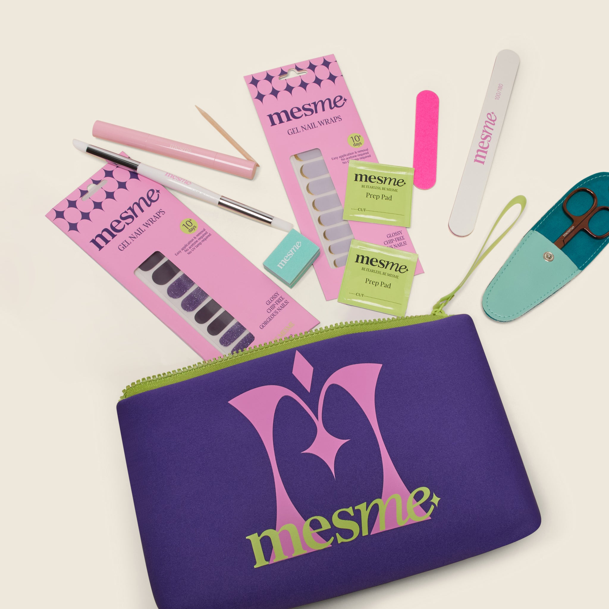 Mesme 10+ Day Nail Wrap Kit with purple cosmetic bag, nail strips, and tools on a light background