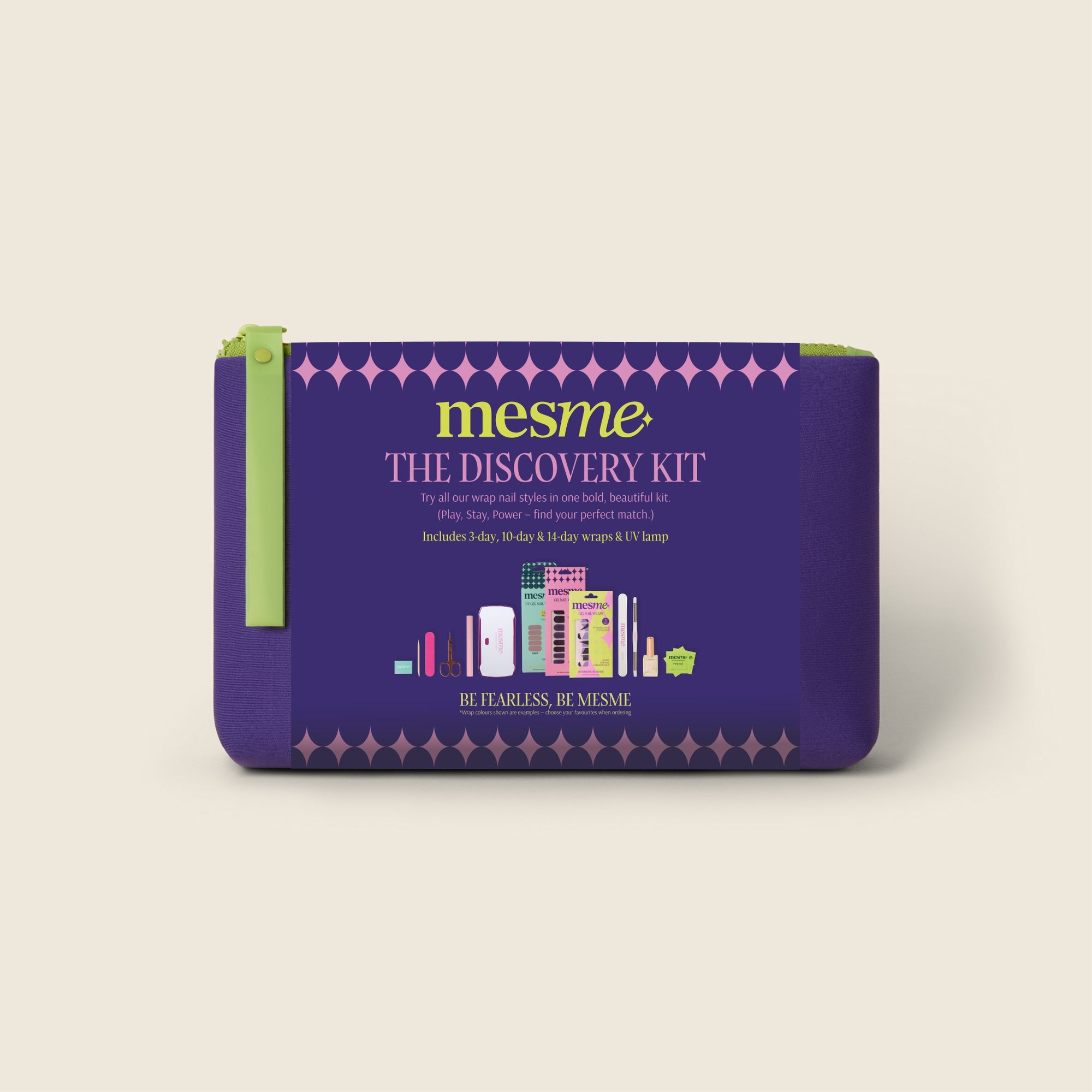 Purple pouch with green zipper labeled 'mesme The Discovery Kit' on a beige background