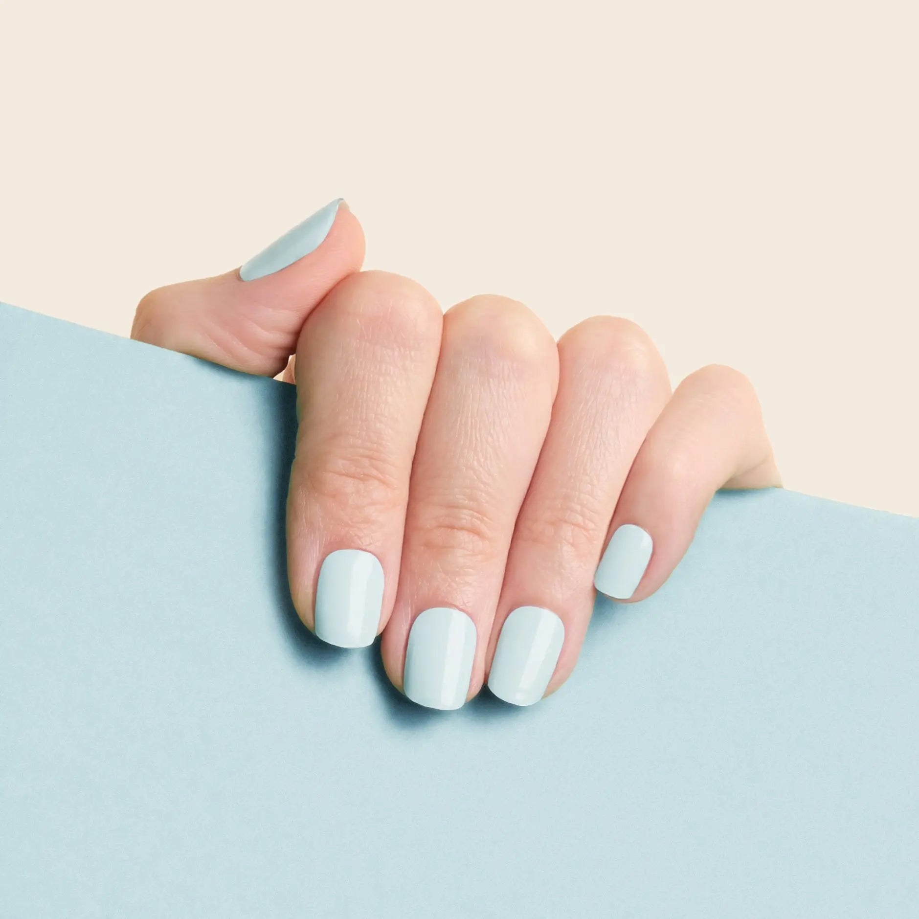 mesme Abigail Pastel Blue 14-Day UV Gel Nail Wraps On Hand