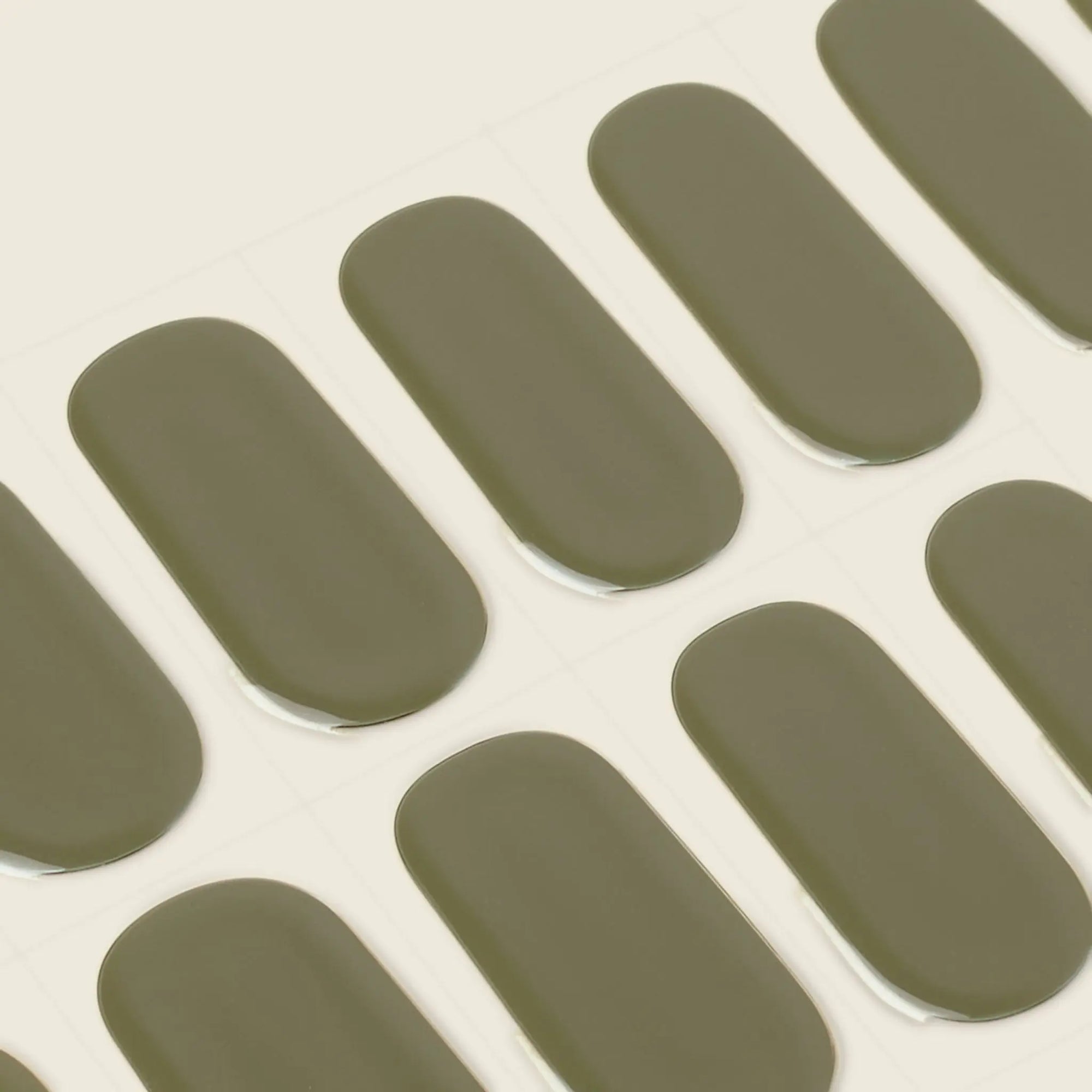 mesme Casey Olive Green 14-Day UV Gel Nail Wraps — Strip Sheet Close-Up