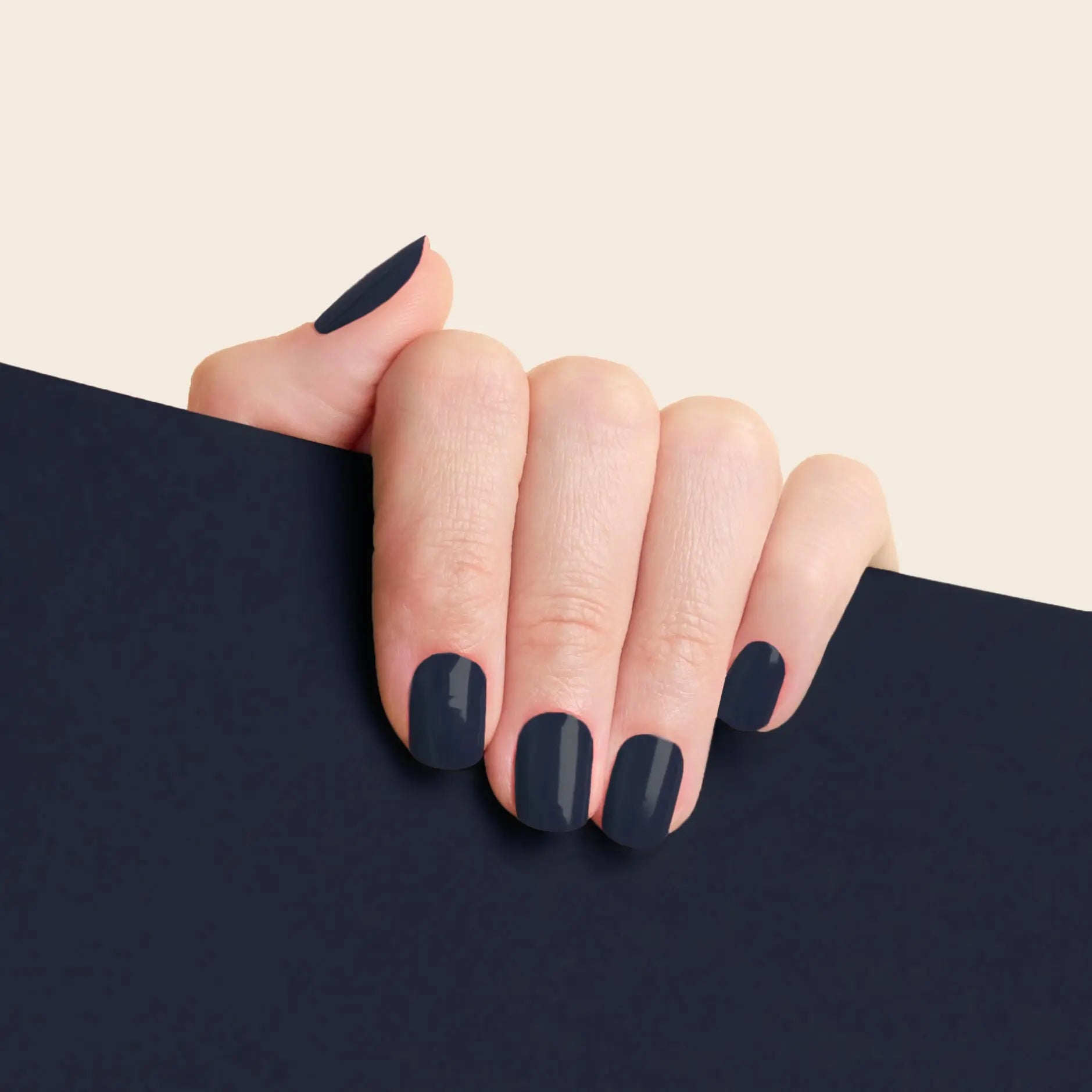 mesme Lyndsey Dark Navy 14-Day UV Gel Nail Wraps On Hand