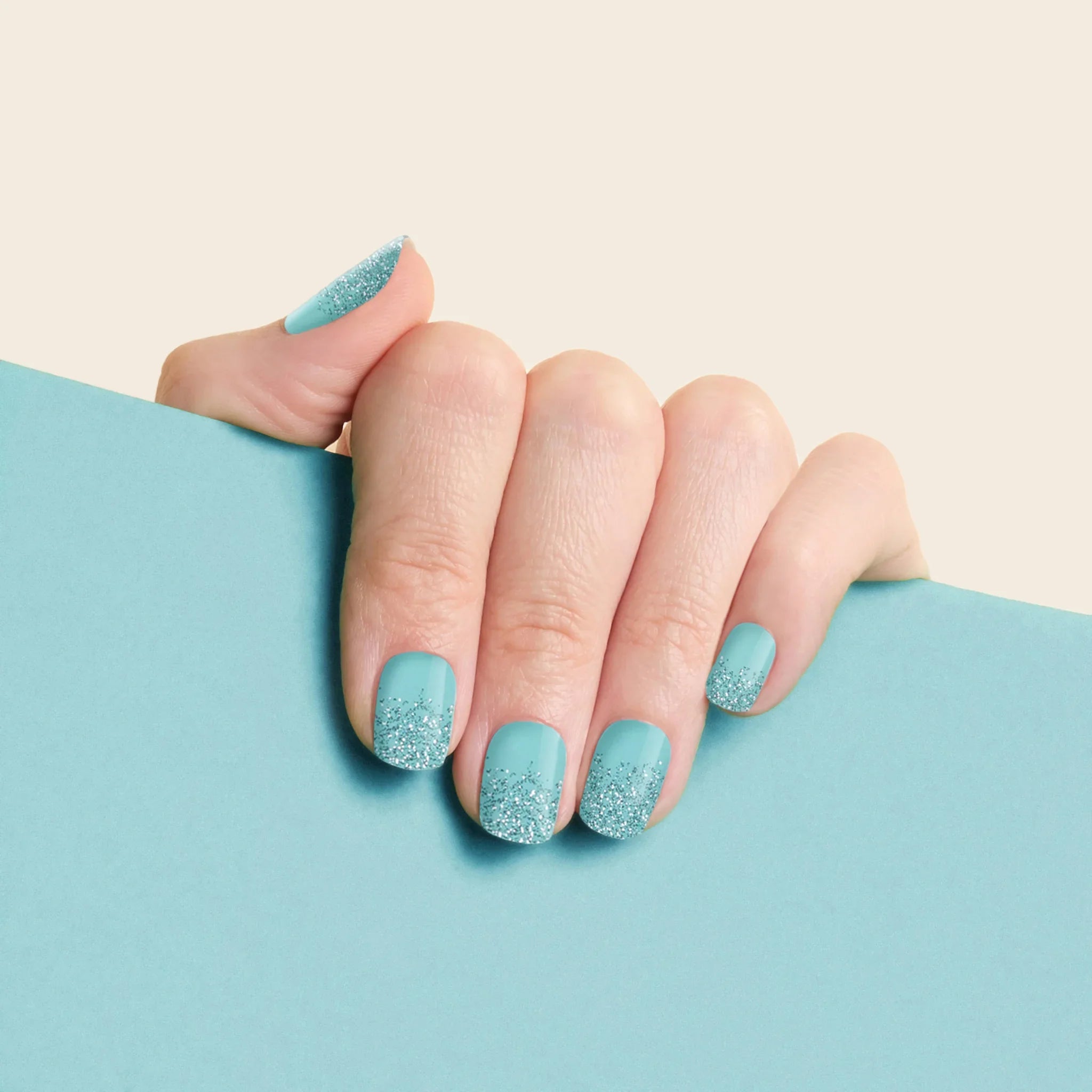 mesme Mariko Tiffany Blue 3+ Day UV-Free Gel Nail Wraps On Hand