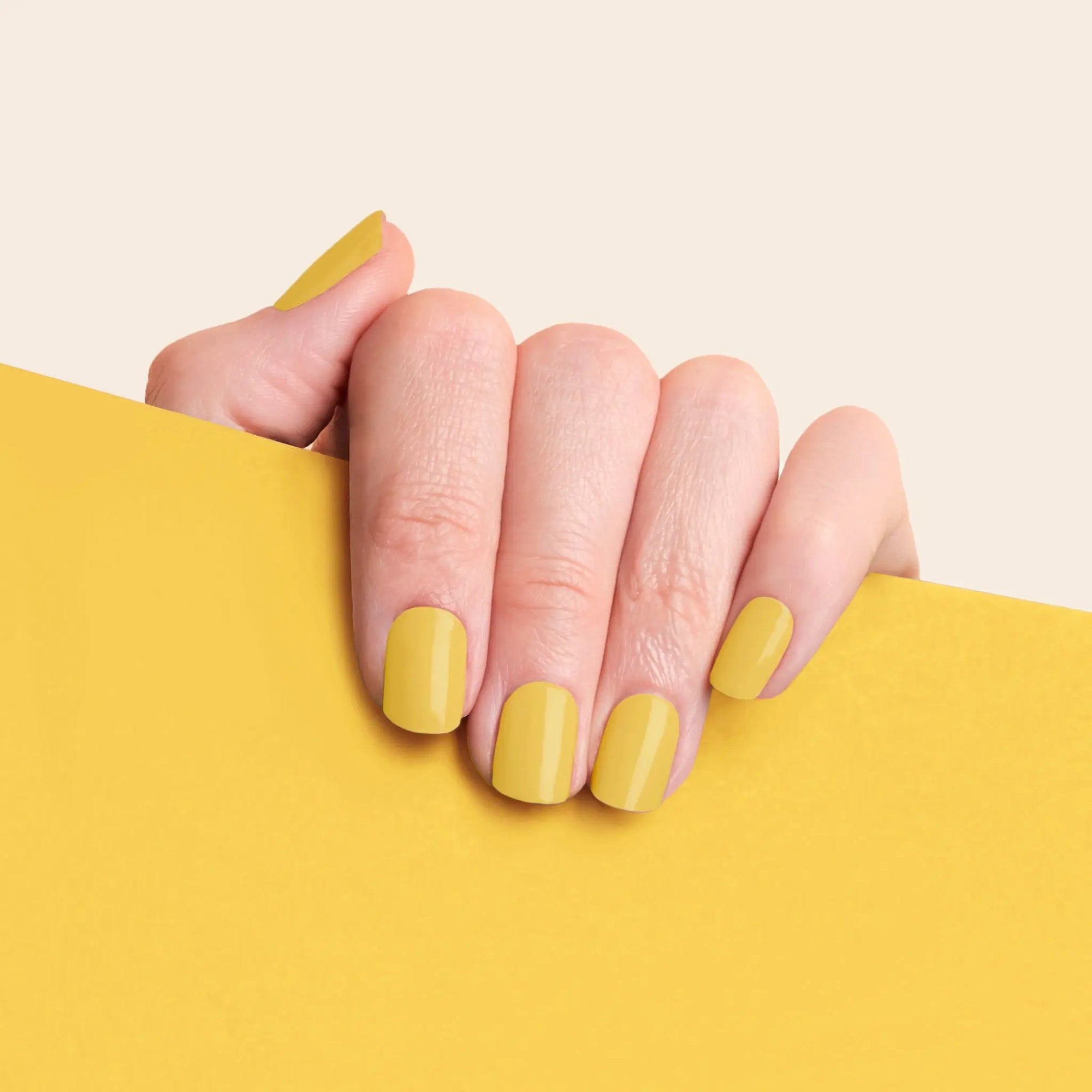 mesme Meri Mustard Yellow 14-Day UV Gel Nail Wraps On Hand