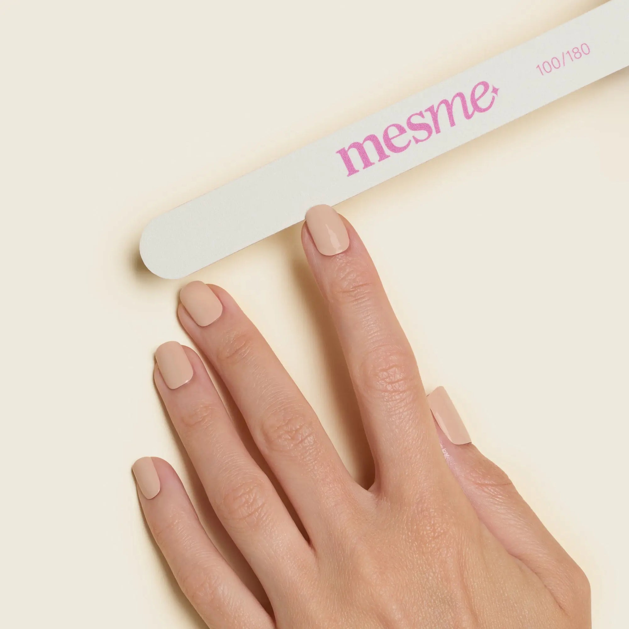 mesme Nail File — filing the nail edge to shape and smooth (in use)