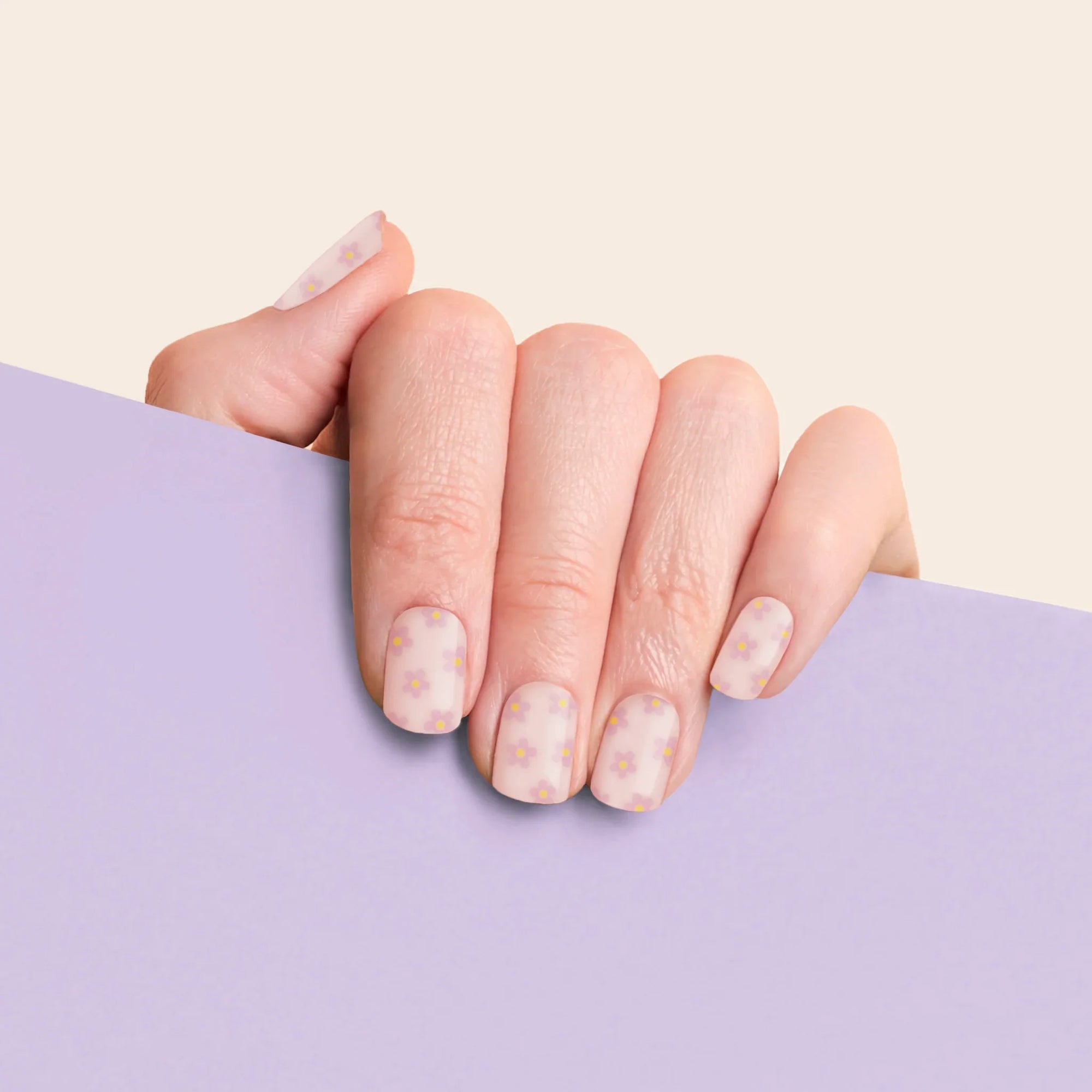 mesme Mia Pastel Daisy 3+ Day UV-Free Gel Nail Wraps On Hand