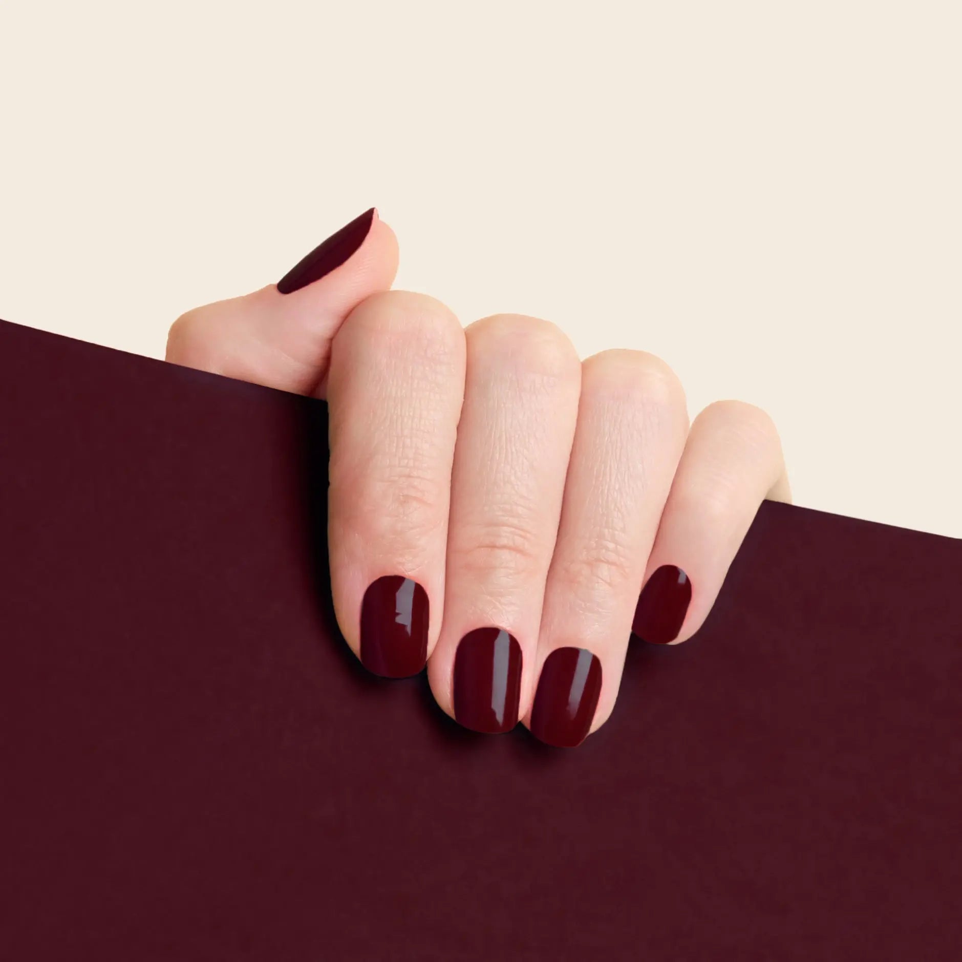 mesme Pili Burgundy Red 14-Day UV Gel Nail Wraps On Hand
