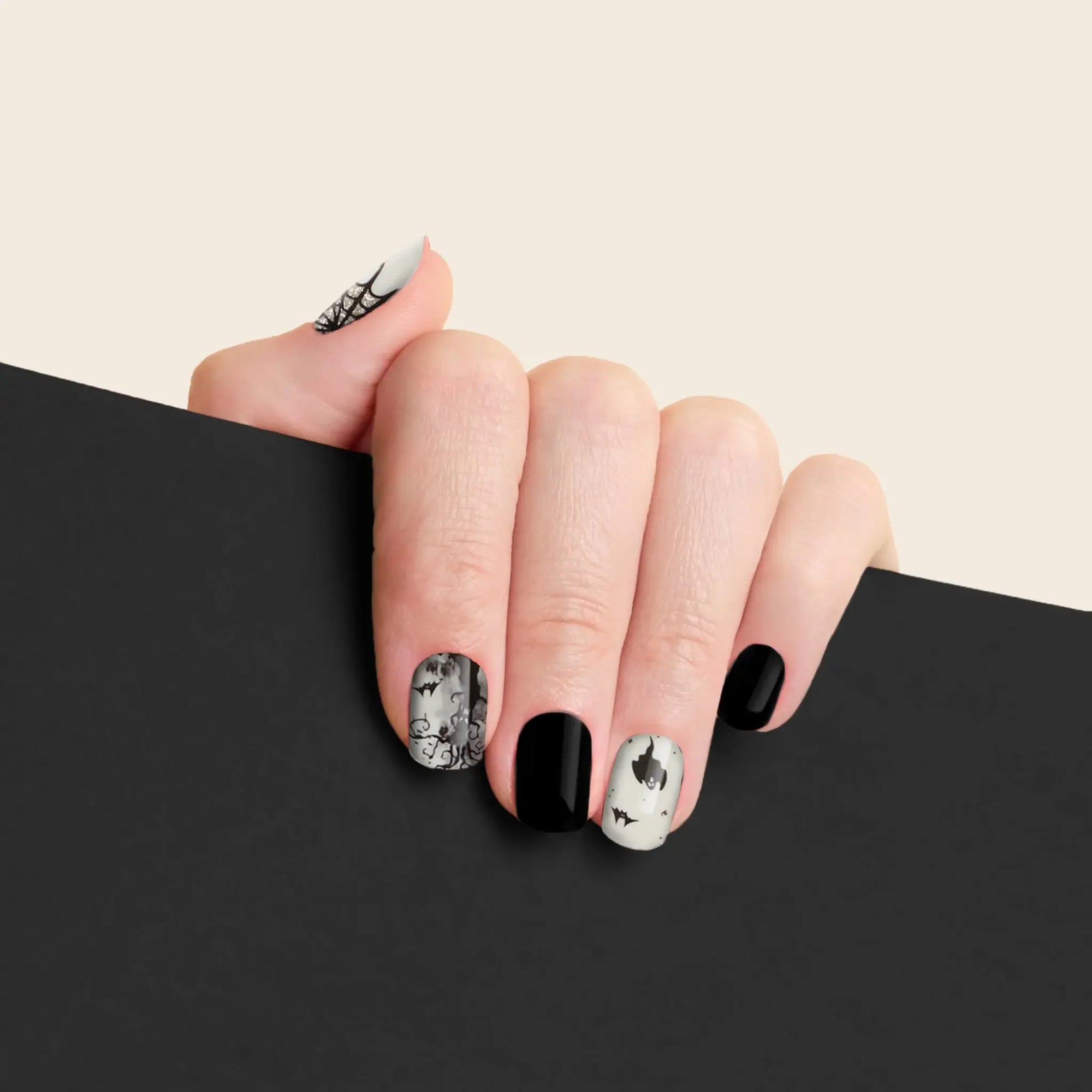 mesme Raven Black Gray 3+ Day UV-Free Gel Nail Wraps On Hand