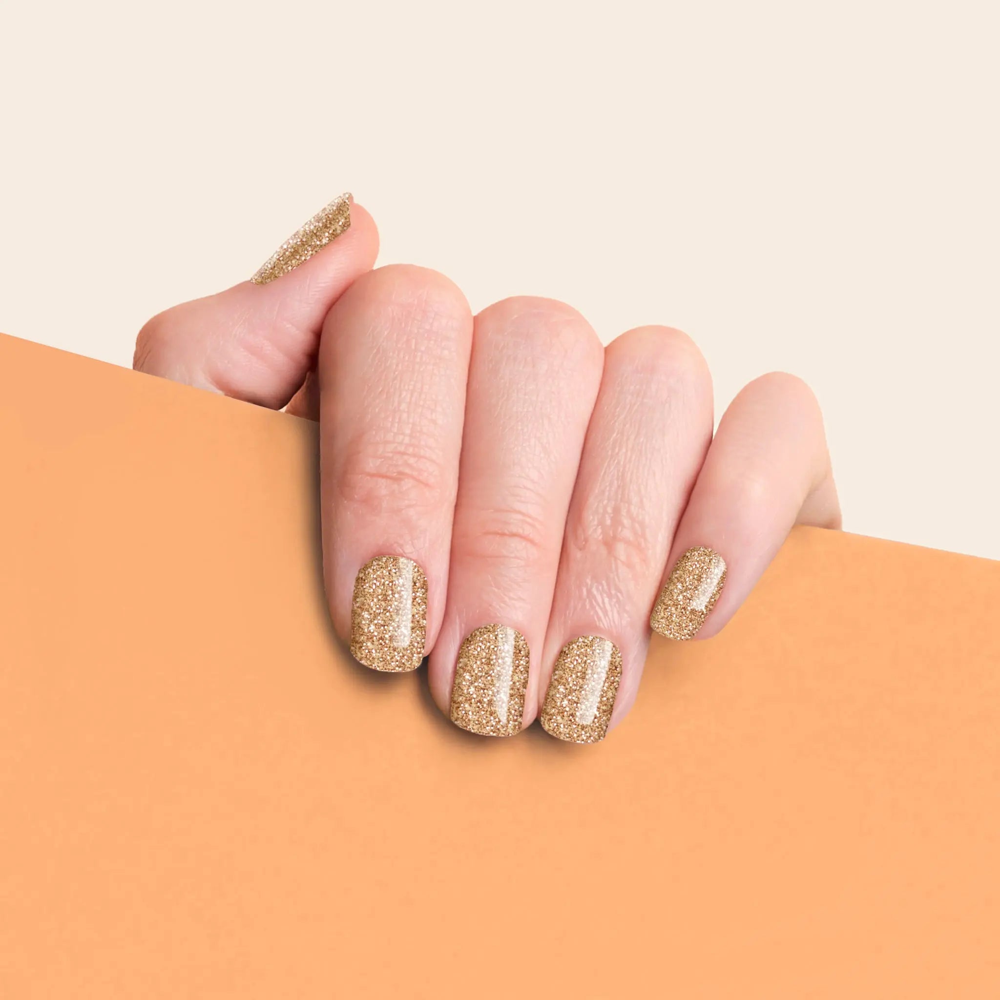 mesme Therese Gold Glitter 10-Day UV-Free Nail Wraps On Hand